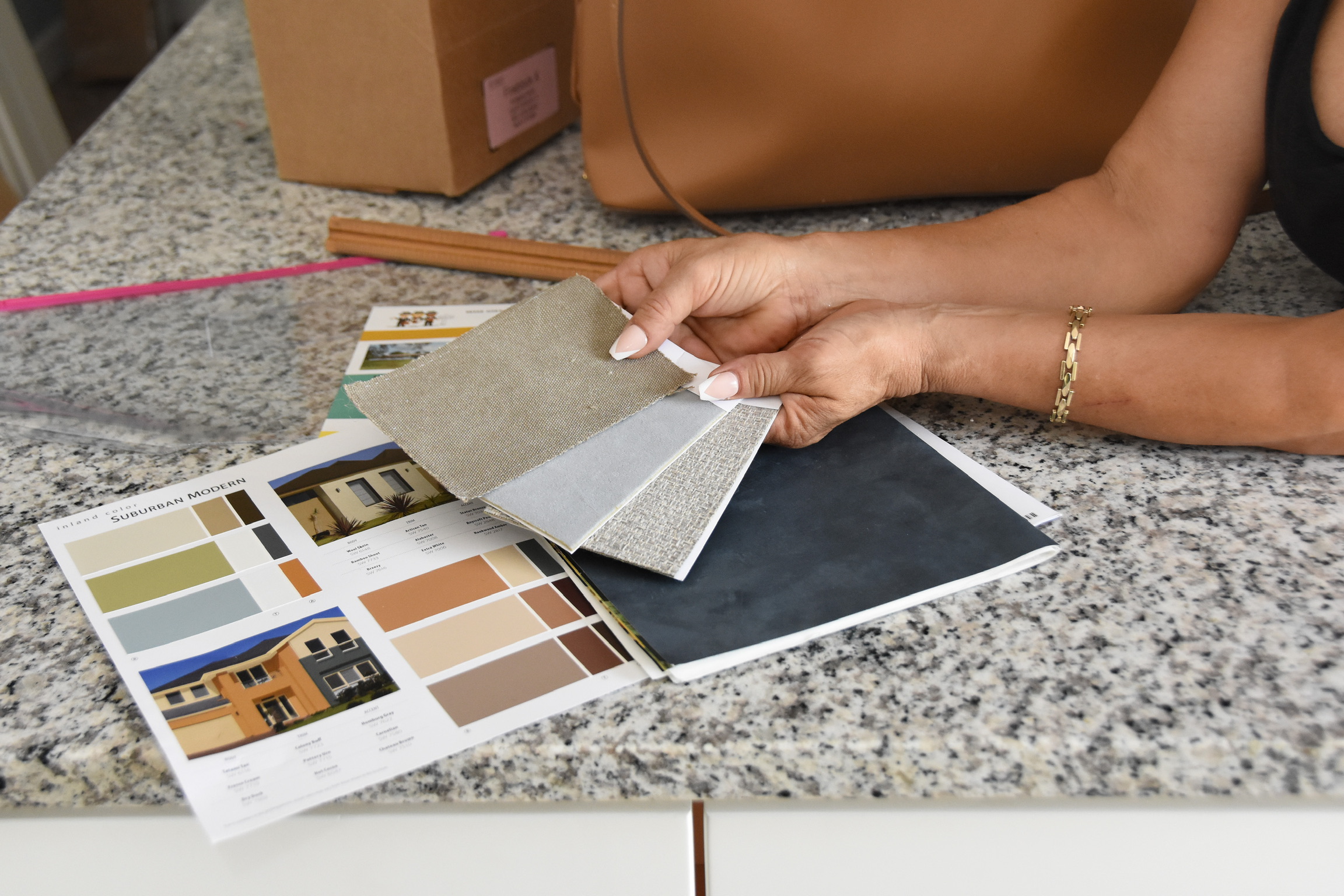 Finish and material samples laid out during the design selection stage