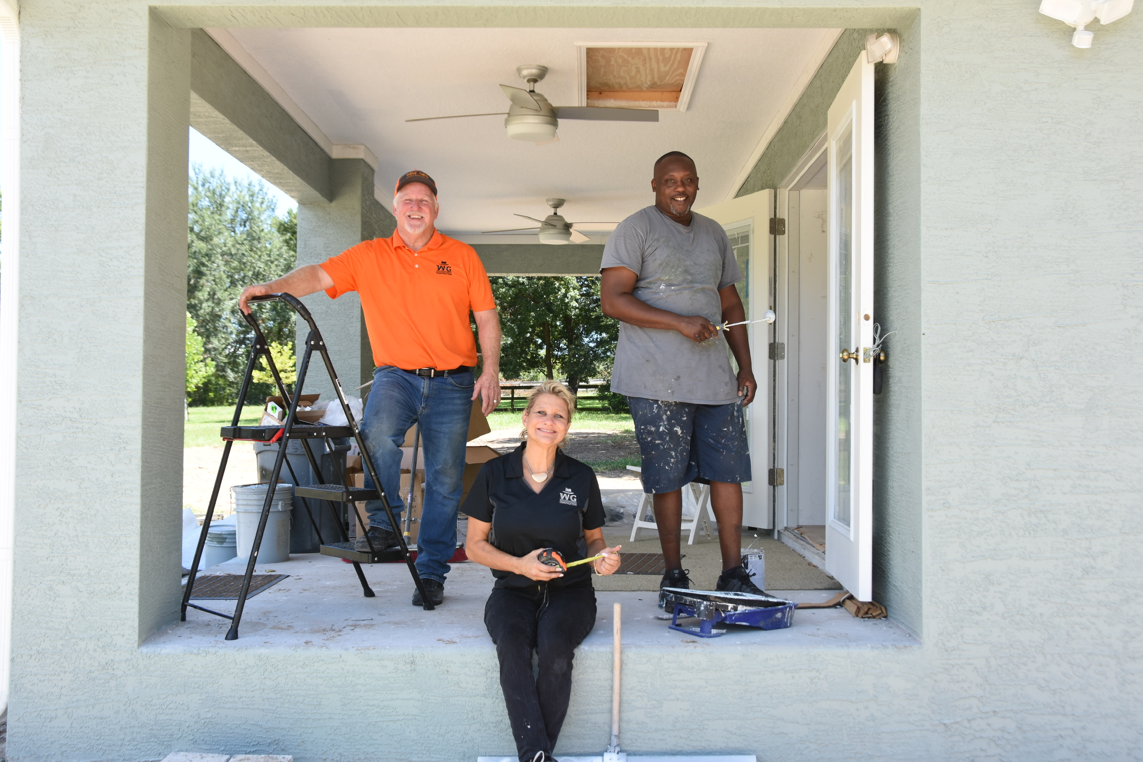 The Wise Gies Construction crew standing in the doorway of a project