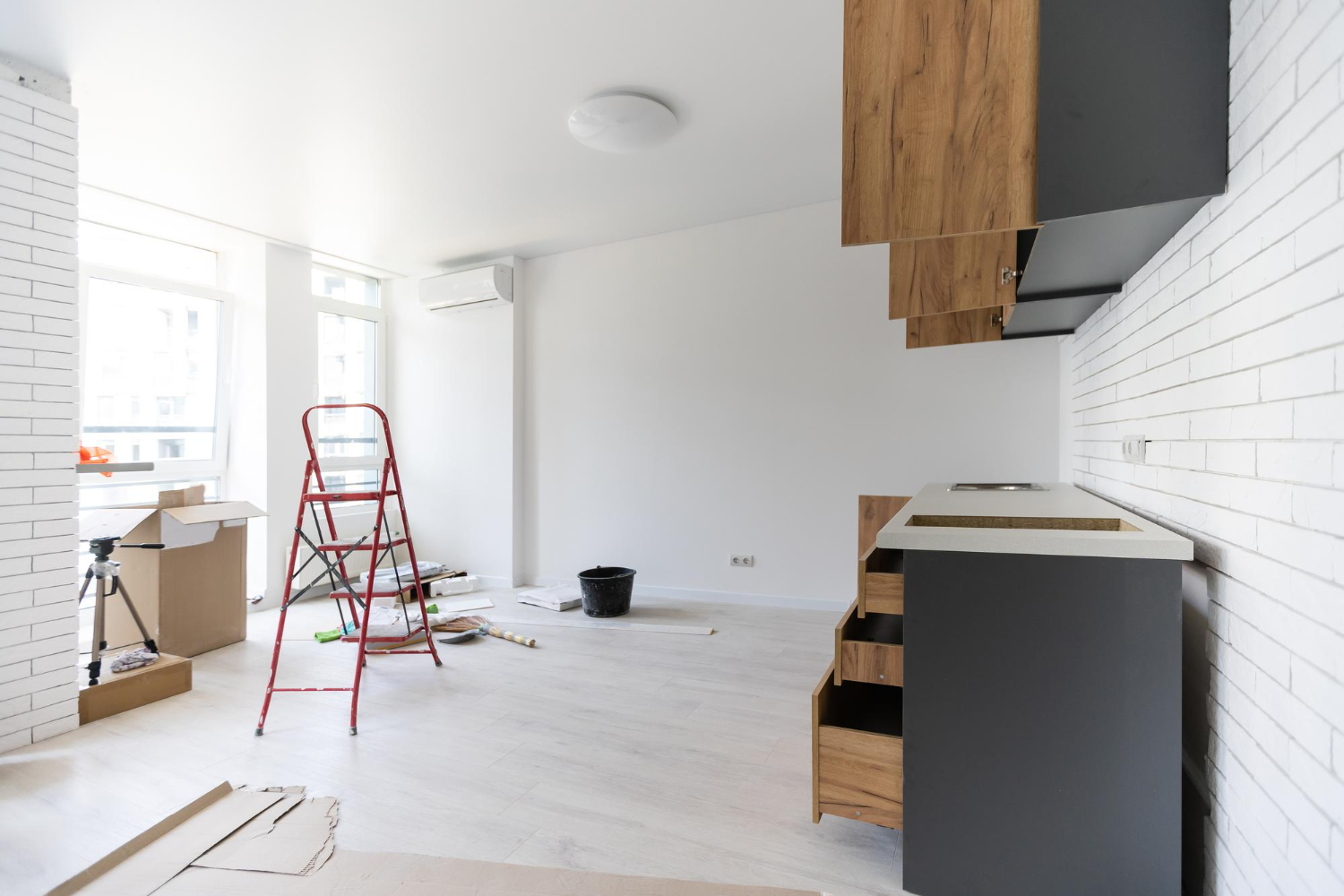 Interior renovation in progress with new cabinetry and fresh finishes